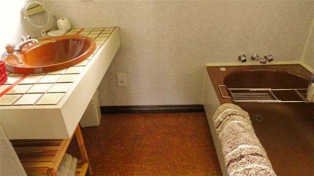 A central bathroom on the upper level with separate toilet & Laundry